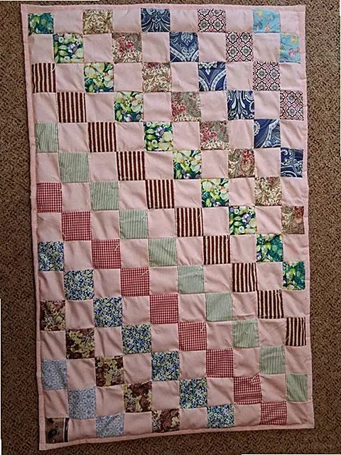 35" X 52" machine-pieced hand-knotted crib comforter (baby quilt) #12